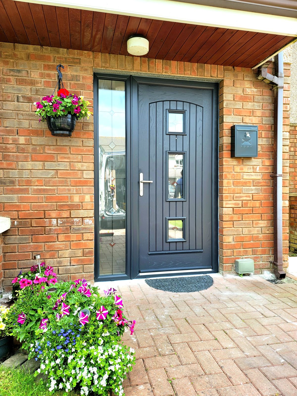 Anthracite front door with leaded side panel