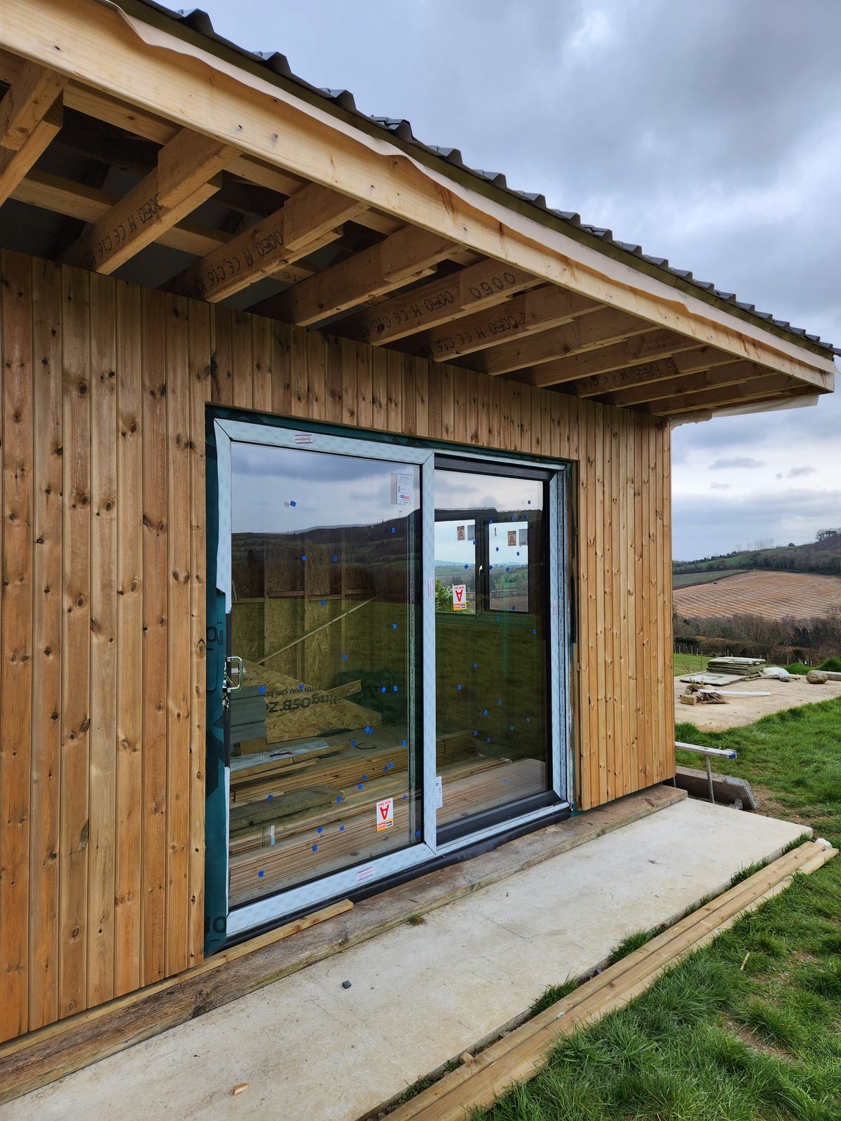 Sliding door on a timber garden building