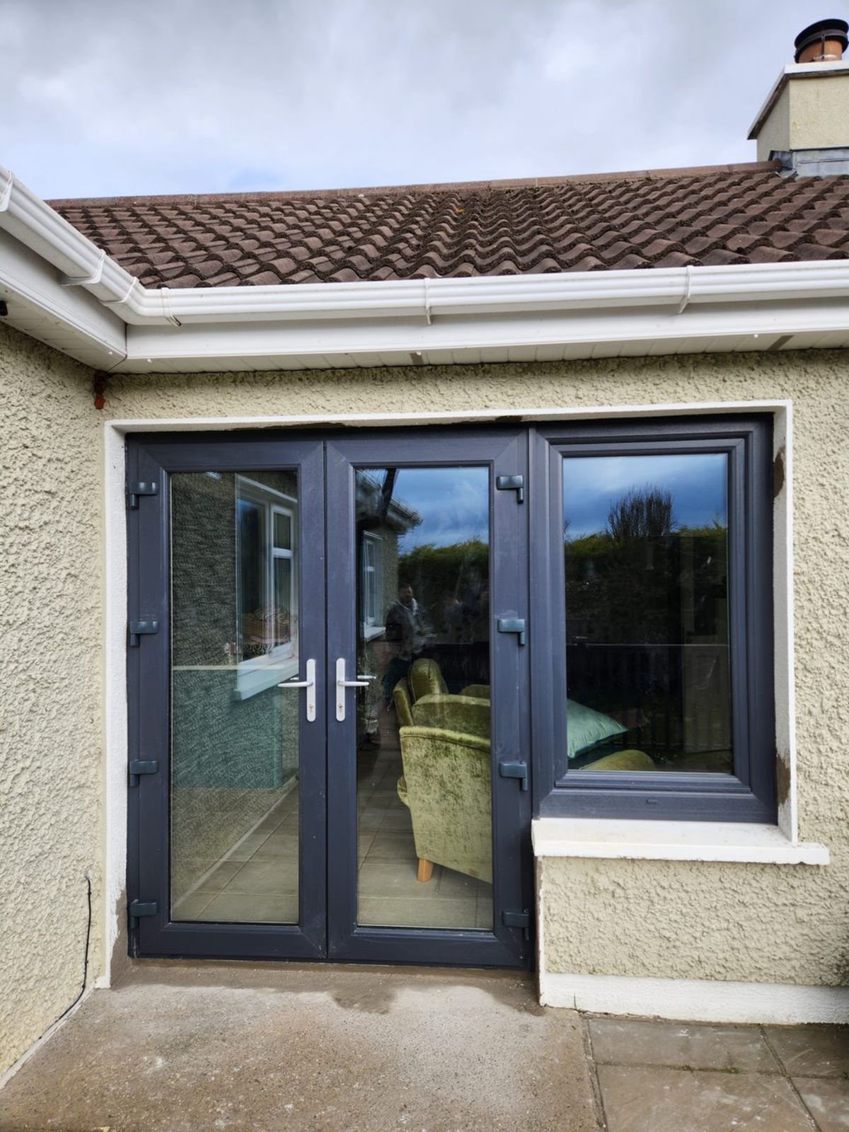 Anthracite French doors and window on an extension