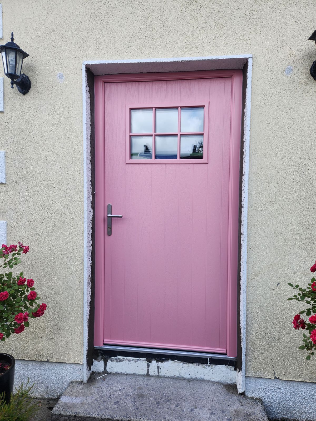 Pink cottage-style front door