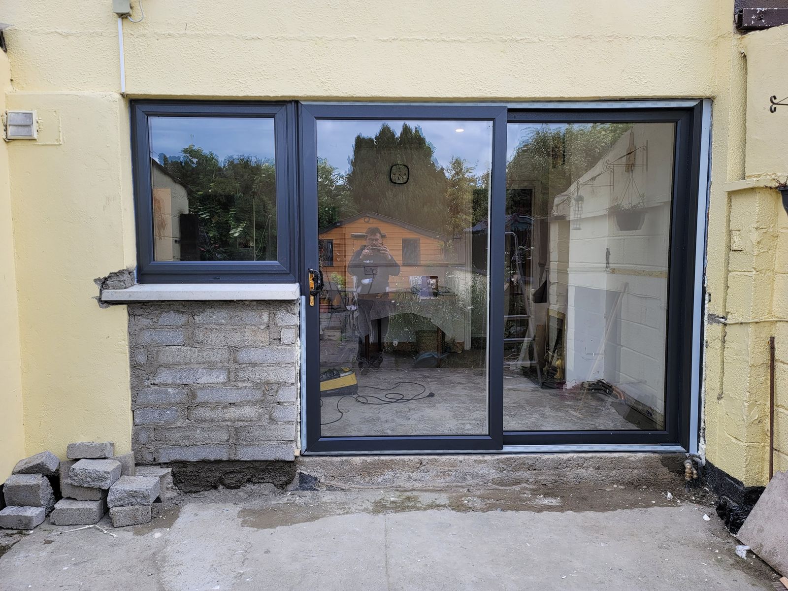 Anthracite sliding patio door and matching window